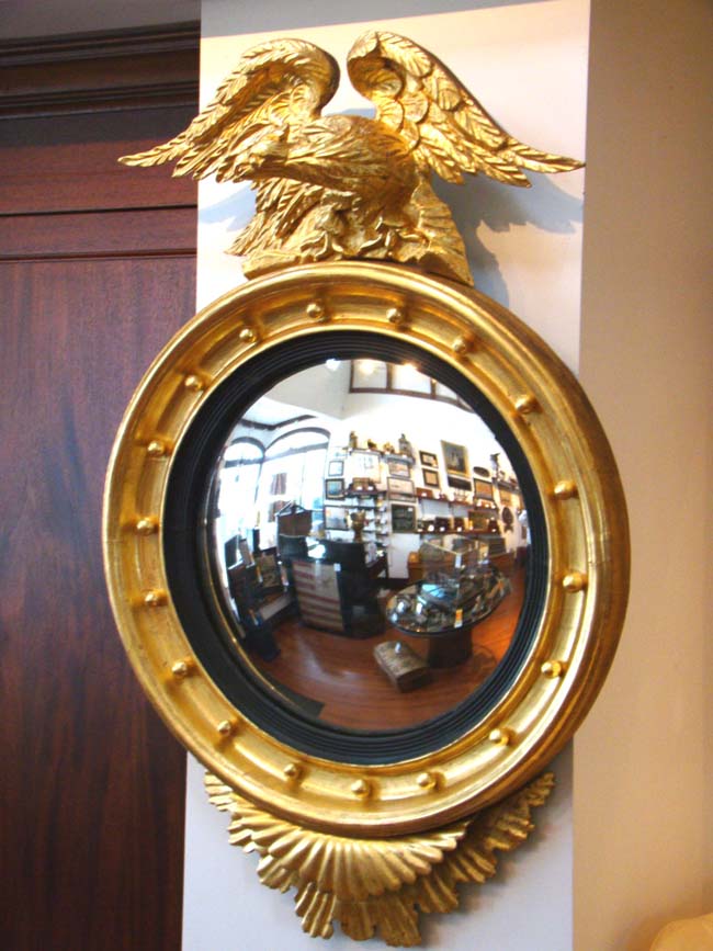 A Federal period Convex Mirror in a carved gilt wood frame surmounted by an eagle circa 1810-1820 — image 2